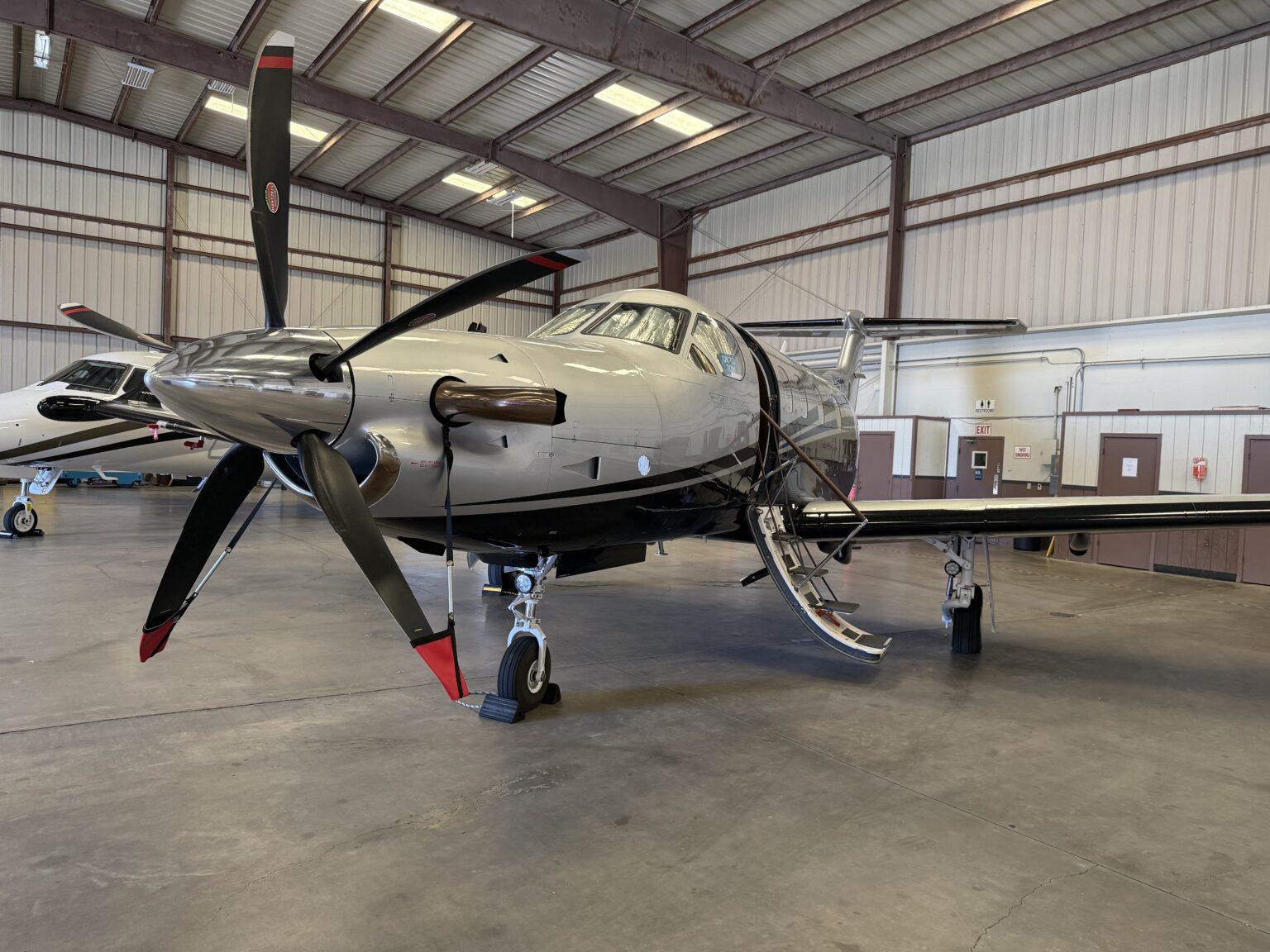 Private aircraft in a hangar